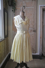 Load image into Gallery viewer, Vintage 1950s dress lemon yellow pastel - Carnegie London - Belt day dress
