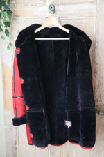 Load image into Gallery viewer, Vintage 1980s bright red and black sheepskin leather coat hood
