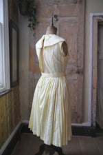 Load image into Gallery viewer, Vintage 1950s dress lemon yellow pastel - Carnegie London - Belt day dress
