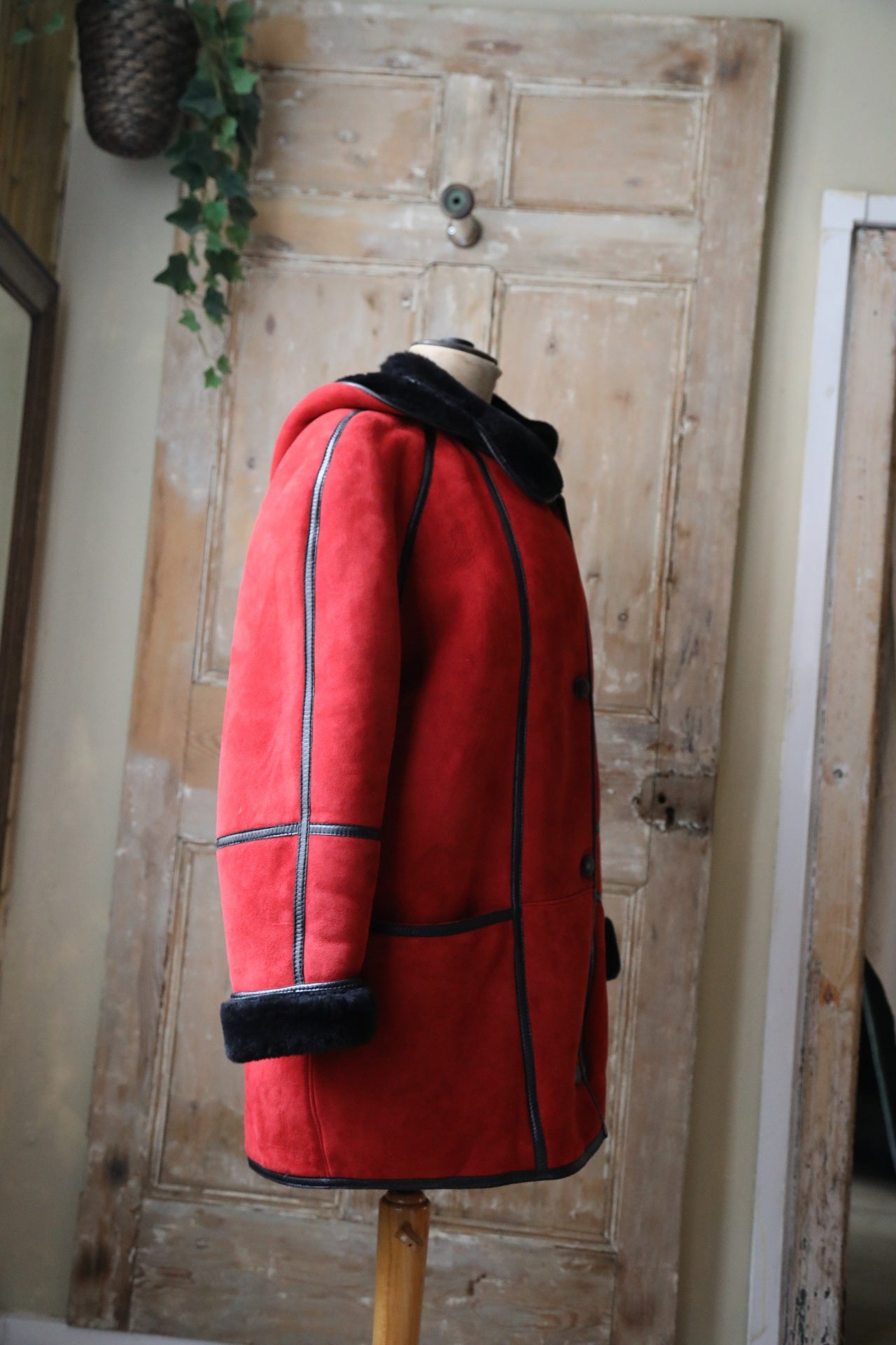 Vintage 1980s bright red and black sheepskin leather coat hood