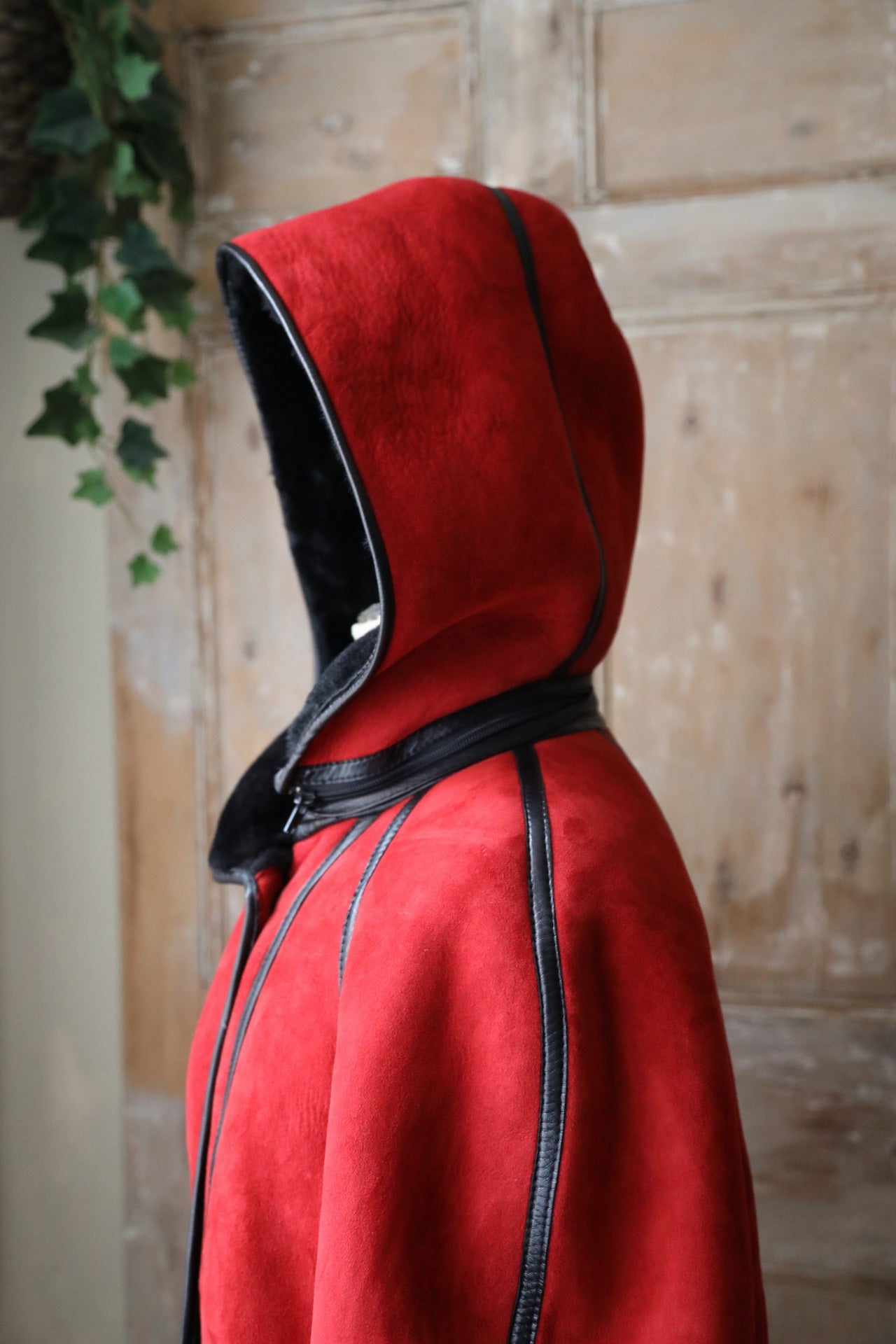 Vintage 1980s bright red and black sheepskin leather coat hood