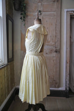 Load image into Gallery viewer, Vintage 1950s dress lemon yellow pastel - Carnegie London - Belt day dress
