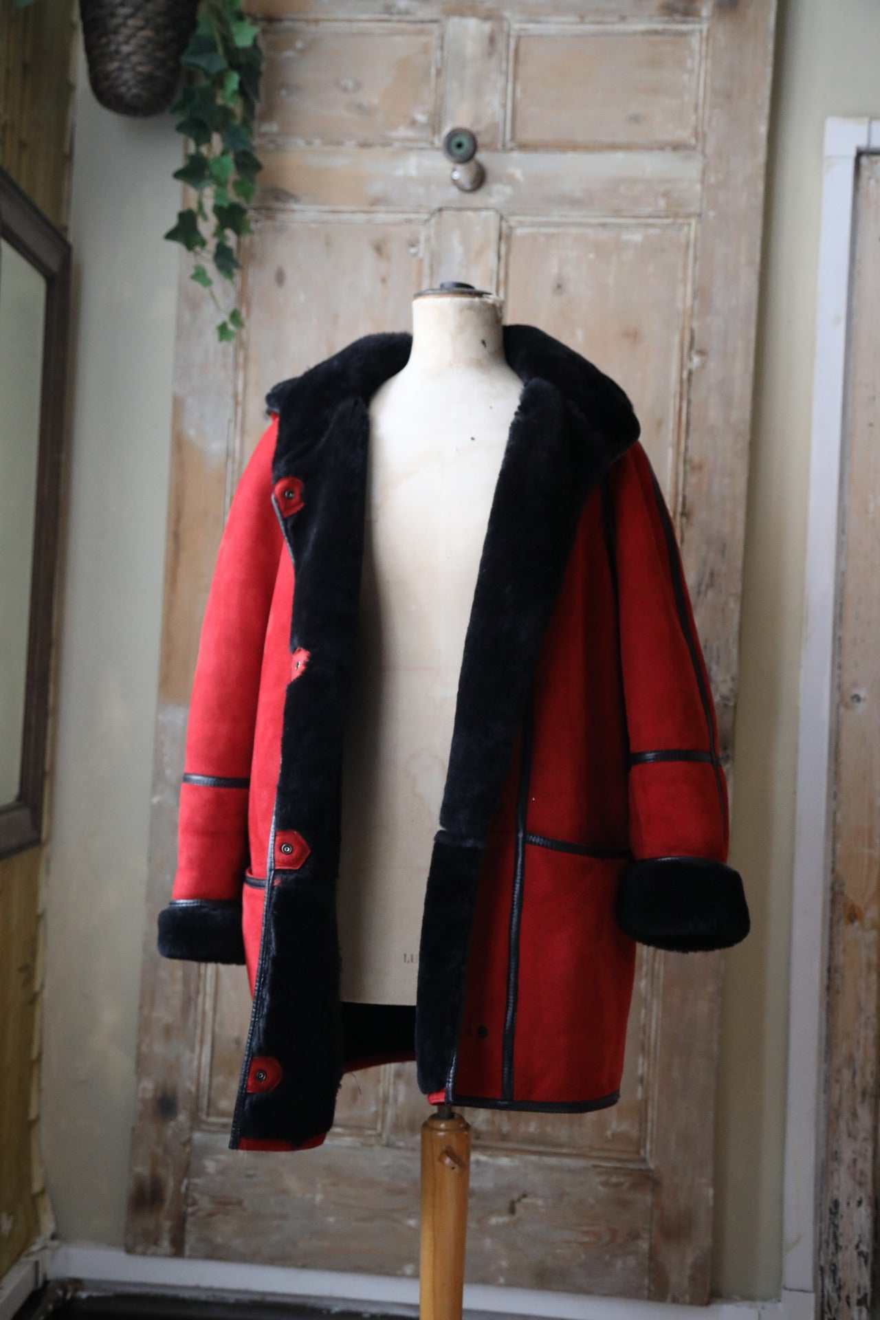 Vintage 1980s bright red and black sheepskin leather coat hood