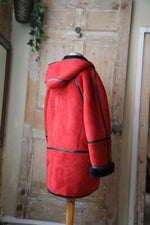 Load image into Gallery viewer, Vintage 1980s bright red and black sheepskin leather coat hood
