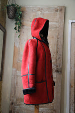 Load image into Gallery viewer, Vintage 1980s bright red and black sheepskin leather coat hood
